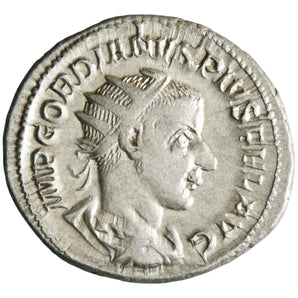 Roman: Gordian III (238-244), silver antoninianus (4.63g), Rome mint, 238-244 CE. Hercules standing right, right hand on hip, left hand on club on rock, lion-skin beside club.